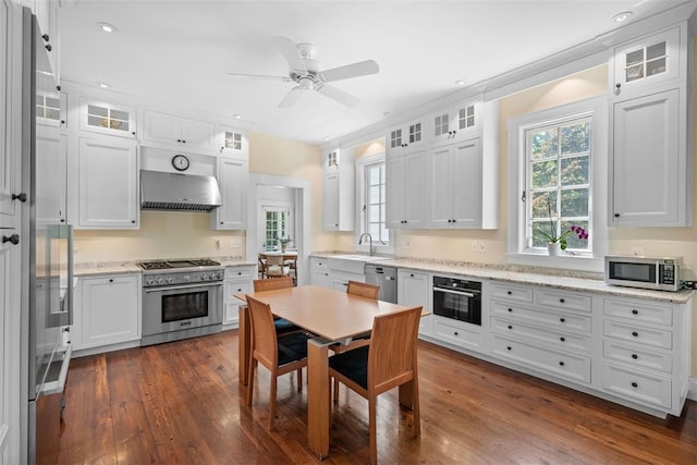 904-906 Blackburn Rd, Sewickley Heights, PA 15143 - kitchen featuring stainless steel appliances, ventilation hood, white cabinetry, recessed lighting, and ceiling fan