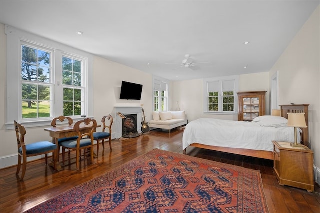904-906 Blackburn Rd, Sewickley Heights, PA 15143 - bedroom with dark wood finished floors, multiple windows, a fireplace with flush hearth, recessed lighting, and ceiling fan