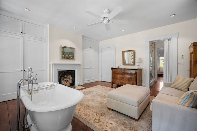 904-906 Blackburn Rd, Sewickley Heights, PA 15143 - living area featuring wood finished floors, a ceiling fan, recessed lighting, and a fireplace with flush hearth