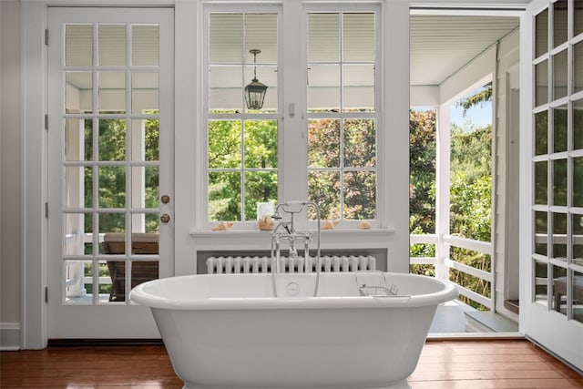 904-906 Blackburn Rd, Sewickley Heights, PA 15143 - bathroom featuring a soaking tub and wood finished floors