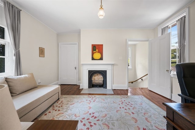 904-906 Blackburn Rd, Sewickley Heights, PA 15143 - living room with wood finished floors, a fireplace with flush hearth, and crown molding