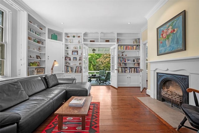 904-906 Blackburn Rd, Sewickley Heights, PA 15143 - living area with ornamental molding, built in features, wood finished floors, and a fireplace with flush hearth