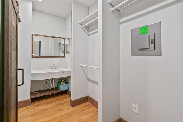 4034 Willow St, Lawrenceville, PA 15201 - walk in closet featuring wood finished floors and electric panel