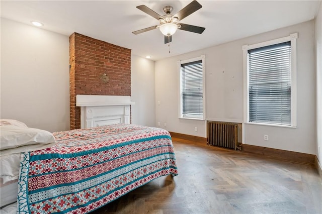 4034 Willow St, Lawrenceville, PA 15201 - bedroom with radiator, multiple windows, and ceiling fan