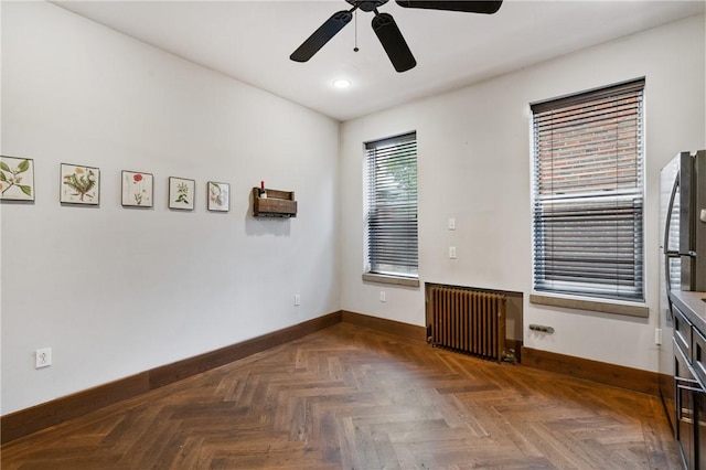 4034 Willow St, Lawrenceville, PA 15201 - spare room featuring radiator heating unit, a ceiling fan, and recessed lighting