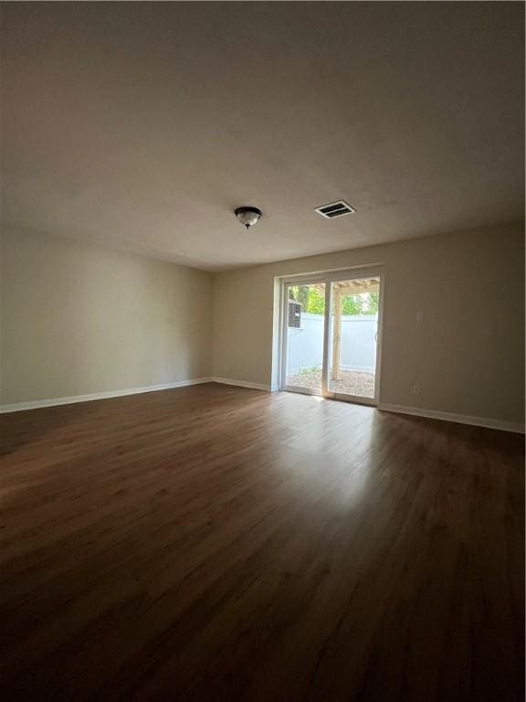 2413 Park Hill Dr, East Hills, PA 15221 - spare room featuring dark wood finished floors and baseboards
