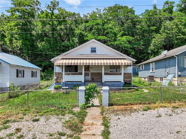 41 Taylor Ave, East Bethlehem, PA 15322 - bungalow-style home featuring covered porch and a fenced front yard