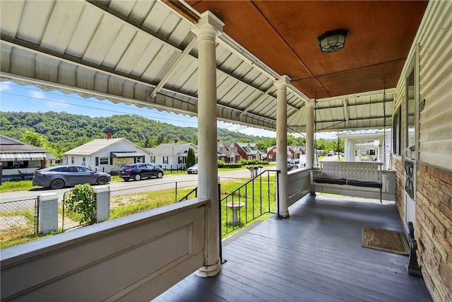 41 Taylor Ave, East Bethlehem, PA 15322 - wooden porch featuring a residential view and a lawn