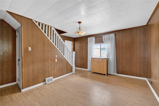 41 Taylor Ave, East Bethlehem, PA 15322 - foyer with stairway, wood finished floors, and wood walls