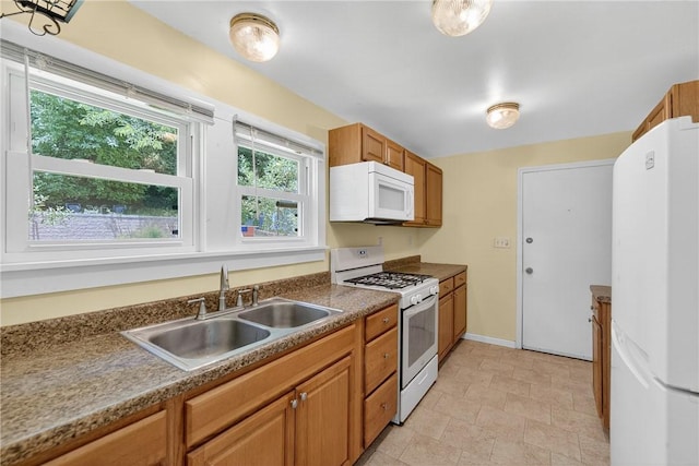 41 Taylor Ave, East Bethlehem, PA 15322 - kitchen with white appliances and brown cabinets