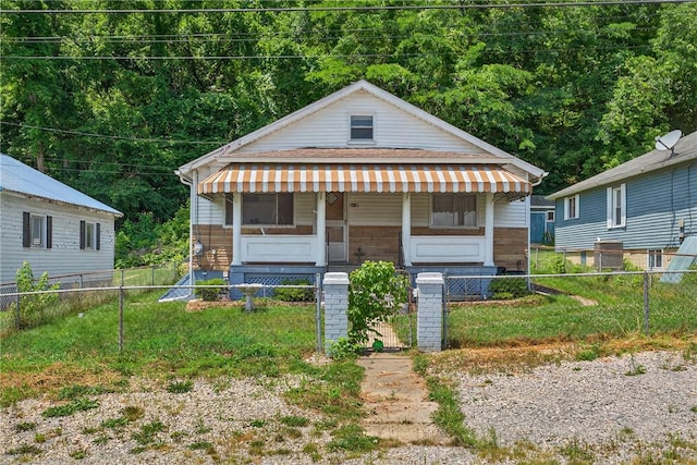 41 Taylor Ave, East Bethlehem, PA 15322 - bungalow-style home with a porch and a fenced front yard