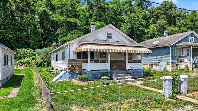 41 Taylor Ave, East Bethlehem, PA 15322 - view of front of house featuring a shingled roof and a chimney