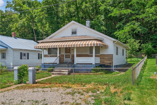 41 Taylor Ave, East Bethlehem, PA 15322 - view of front of property with a porch, a shingled roof, and a chimney