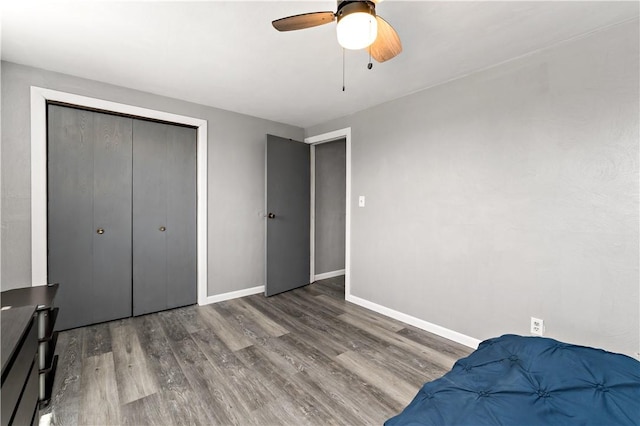553 Indus St, Greenfield, PA 15207 - bedroom with wood finished floors, a closet, and a ceiling fan