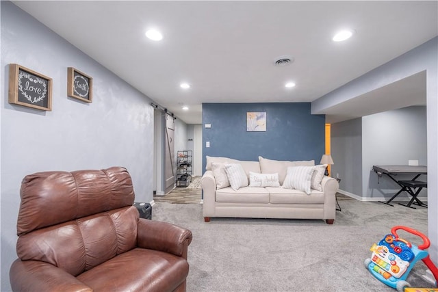 325 Clements Rd, Plum Boro, PA 15239 - living area with a barn door, recessed lighting, and carpet flooring