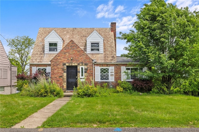 1000 Prospect Rd, Whitehall, PA 15227 - view of front of property with brick siding, a chimney, and a front lawn