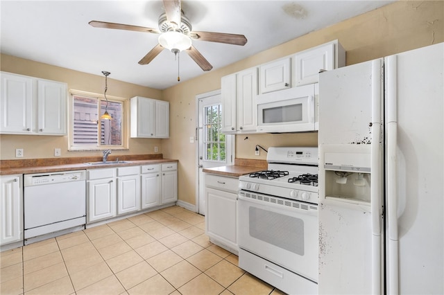 1000 Prospect Rd, Whitehall, PA 15227 - kitchen featuring white appliances, white cabinetry, hanging light fixtures, light tile patterned floors, and a ceiling fan
