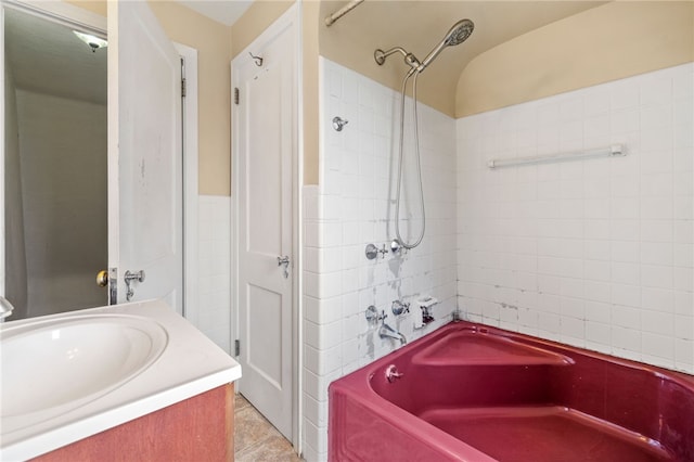 1000 Prospect Rd, Whitehall, PA 15227 - bathroom featuring tile walls, shower / washtub combination, and vanity