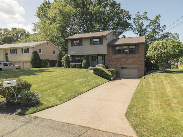 202 Lytton Rd, Moon/Crescent Twp, PA 15108 - split level home featuring brick siding, concrete driveway, a garage, and a front lawn