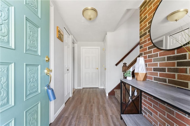 202 Lytton Rd, Moon/Crescent Twp, PA 15108 - entryway with wood finished floors and brick wall