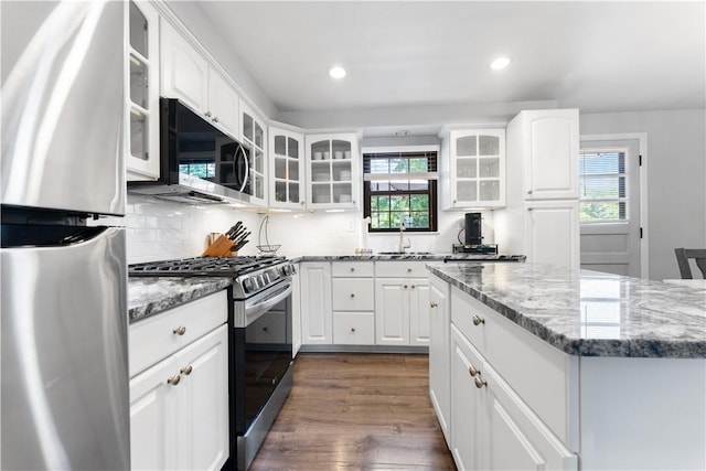 202 Lytton Rd, Moon/Crescent Twp, PA 15108 - kitchen featuring stainless steel appliances, plenty of natural light, dark wood-style floors, white cabinets, and recessed lighting