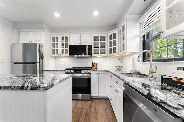 202 Lytton Rd, Moon/Crescent Twp, PA 15108 - kitchen with appliances with stainless steel finishes, recessed lighting, stone countertops, white cabinets, and dark wood-style floors