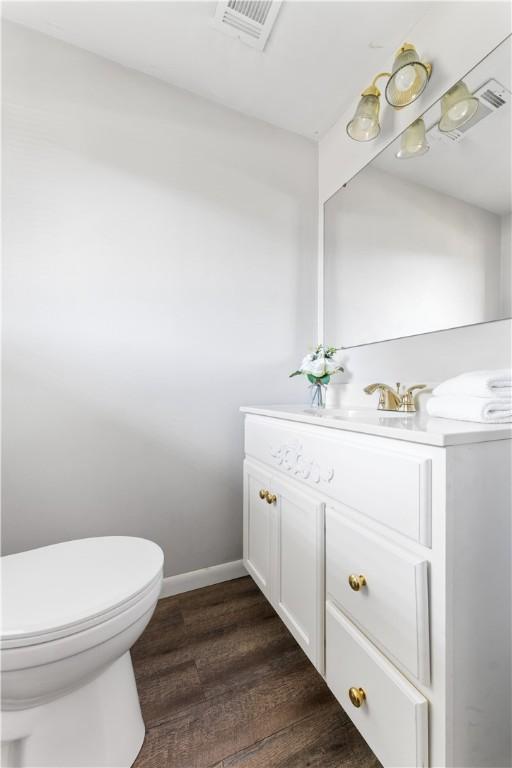 202 Lytton Rd, Moon/Crescent Twp, PA 15108 - bathroom featuring vanity and wood finished floors