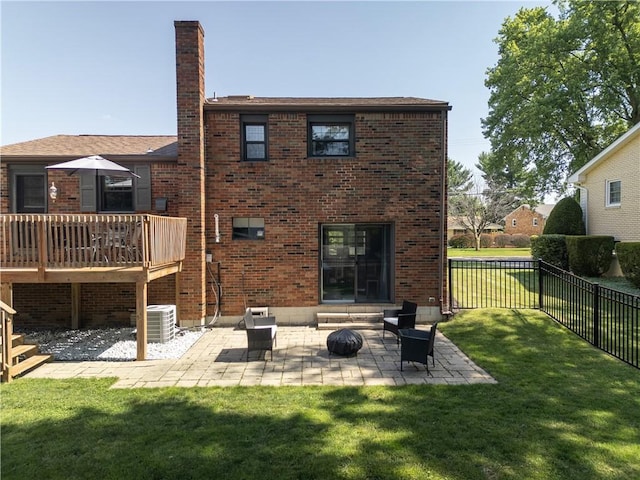 202 Lytton Rd, Moon/Crescent Twp, PA 15108 - rear view of house with a chimney, brick siding, a fenced backyard, and a patio