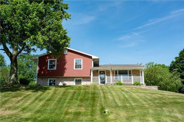 101 Lynne Dr, Big Beaver, PA 15010 - view of front of home with a porch and a front lawn
