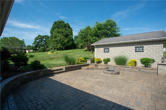 101 Lynne Dr, Big Beaver, PA 15010 - view of patio featuring an outdoor fire pit