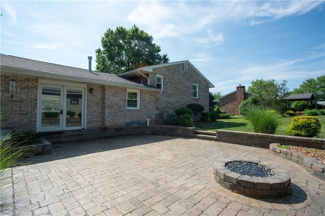 101 Lynne Dr, Big Beaver, PA 15010 - view of patio with french doors and a fire pit