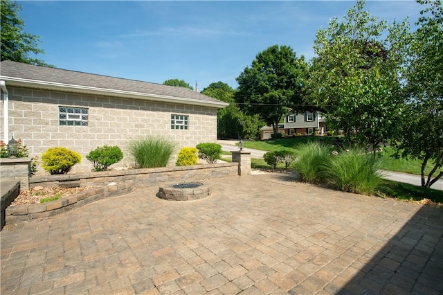 101 Lynne Dr, Big Beaver, PA 15010 - view of patio / terrace with an outdoor fire pit
