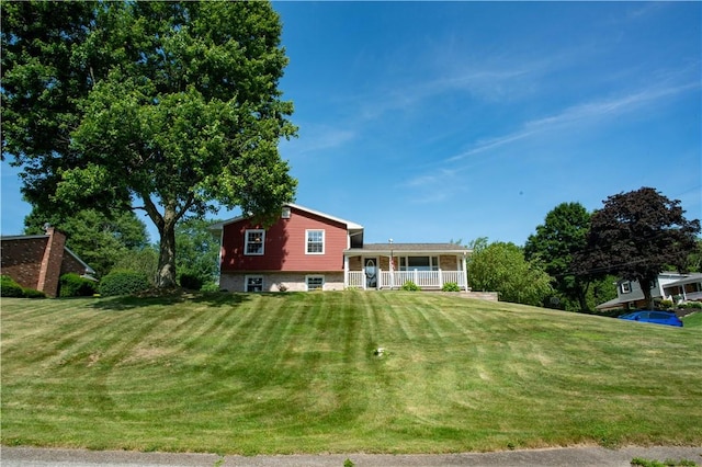 101 Lynne Dr, Big Beaver, PA 15010 - view of front of home featuring a porch and a front lawn