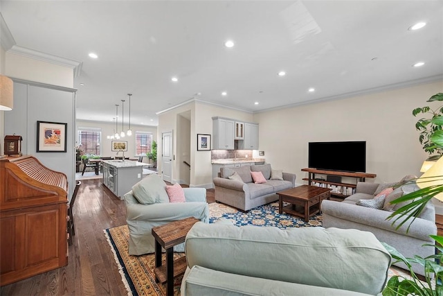 246 42nd St, Lawrenceville, PA 15201 - living room featuring crown molding, recessed lighting, and dark wood-style floors