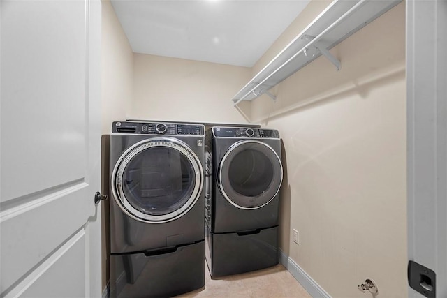 246 42nd St, Lawrenceville, PA 15201 - washroom featuring washing machine and dryer and baseboards