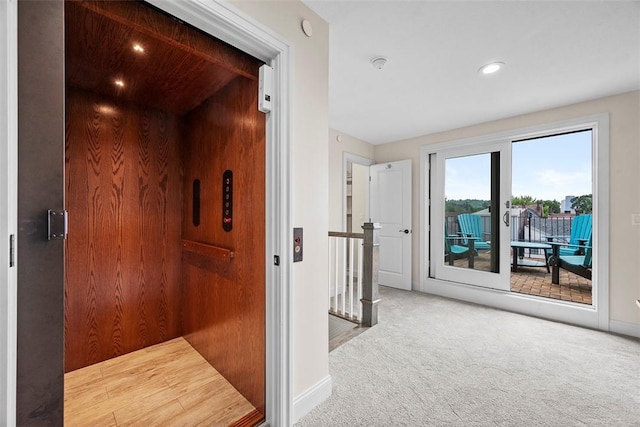246 42nd St, Lawrenceville, PA 15201 - corridor with carpet, an upstairs landing, elevator, and recessed lighting