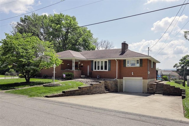 16 Grace Rd, Scottdale, PA 15683 - ranch-style house featuring brick siding, concrete driveway, a chimney, a garage, and a front yard