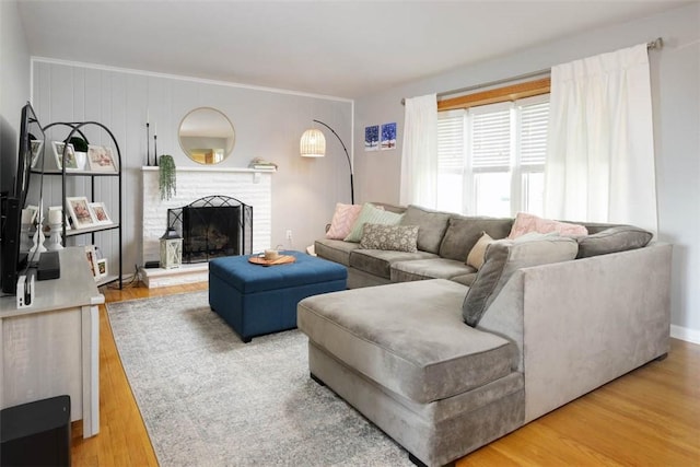 16 Grace Rd, Scottdale, PA 15683 - living room featuring a brick fireplace and wood finished floors