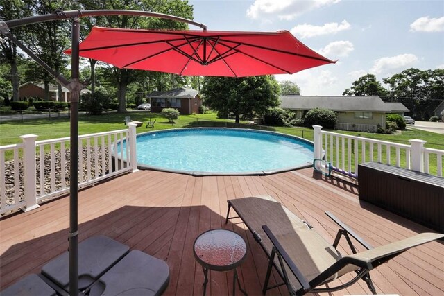 16 Grace Rd, Scottdale, PA 15683 - outdoor pool with a deck, a yard, and an outdoor structure