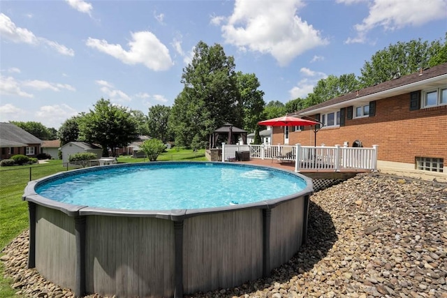 16 Grace Rd, Scottdale, PA 15683 - swimming pool with a deck, a gazebo, and a lawn