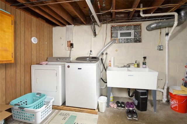16 Grace Rd, Scottdale, PA 15683 - laundry room with washing machine and dryer, concrete block wall, and wood walls