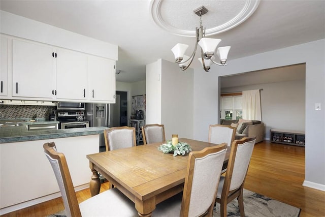 16 Grace Rd, Scottdale, PA 15683 - dining area featuring a chandelier and wood finished floors