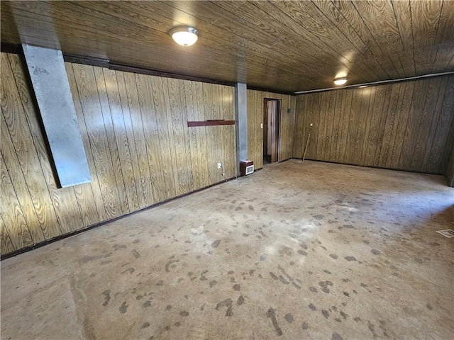 1350 Deerfield Rd, South Franklin, PA 15301 - unfurnished room with unfinished concrete floors, wooden walls, and wood ceiling