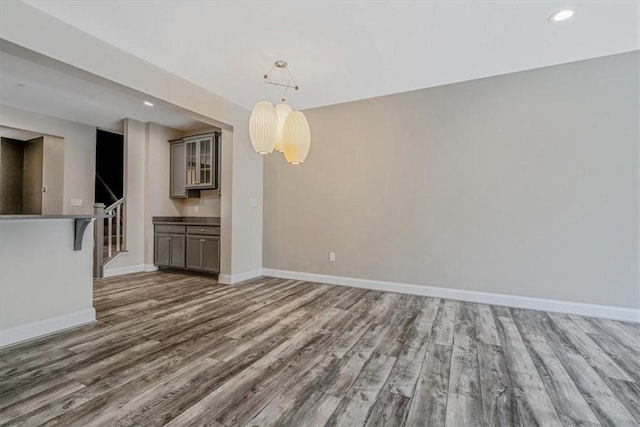 441 Roebling Ct, Cranberry Twp, PA 16066 - unfurnished room with wood finished floors, stairway, and recessed lighting
