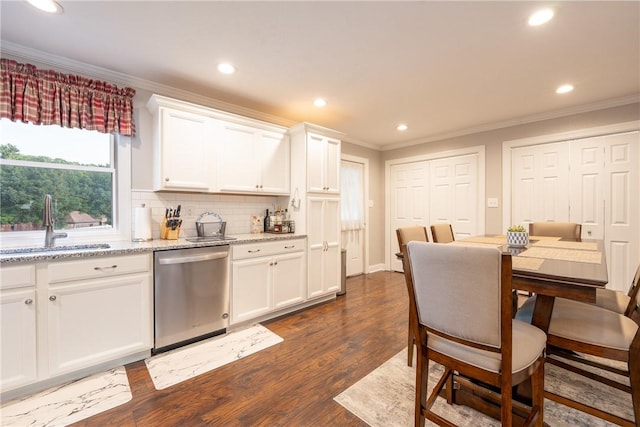 563 Edward St, Derry Twp, PA 15650 - kitchen featuring dishwasher, crown molding, recessed lighting, decorative backsplash, and white cabinetry