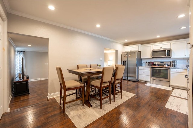 563 Edward St, Derry Twp, PA 15650 - dining area with dark wood finished floors, crown molding, and recessed lighting