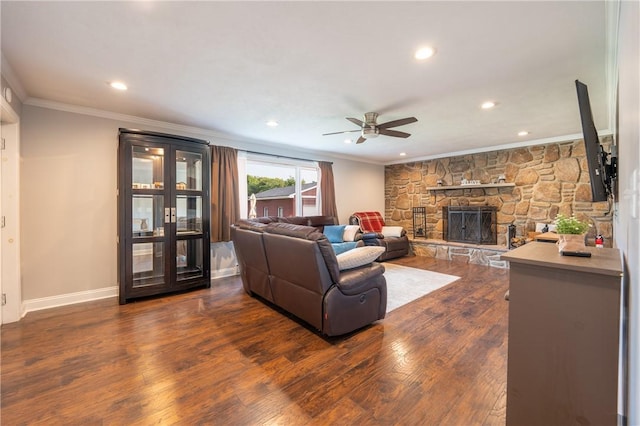 563 Edward St, Derry Twp, PA 15650 - living room with crown molding, a ceiling fan, dark wood-style floors, a fireplace, and recessed lighting