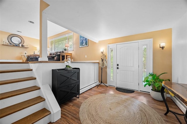 124 Heath Dr, Economy, PA 15005 - foyer entrance featuring a baseboard heating unit, wood finished floors, and stairs
