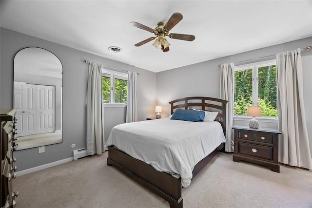 124 Heath Dr, Economy, PA 15005 - bedroom with carpet floors, a ceiling fan, and baseboard heating