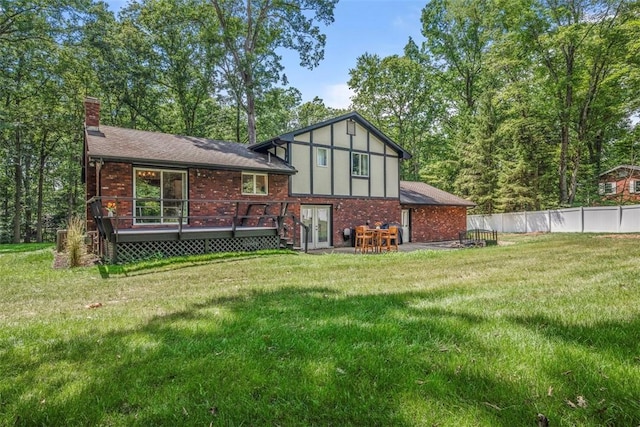 124 Heath Dr, Economy, PA 15005 - rear view of property featuring a wooden deck, a chimney, and brick siding
